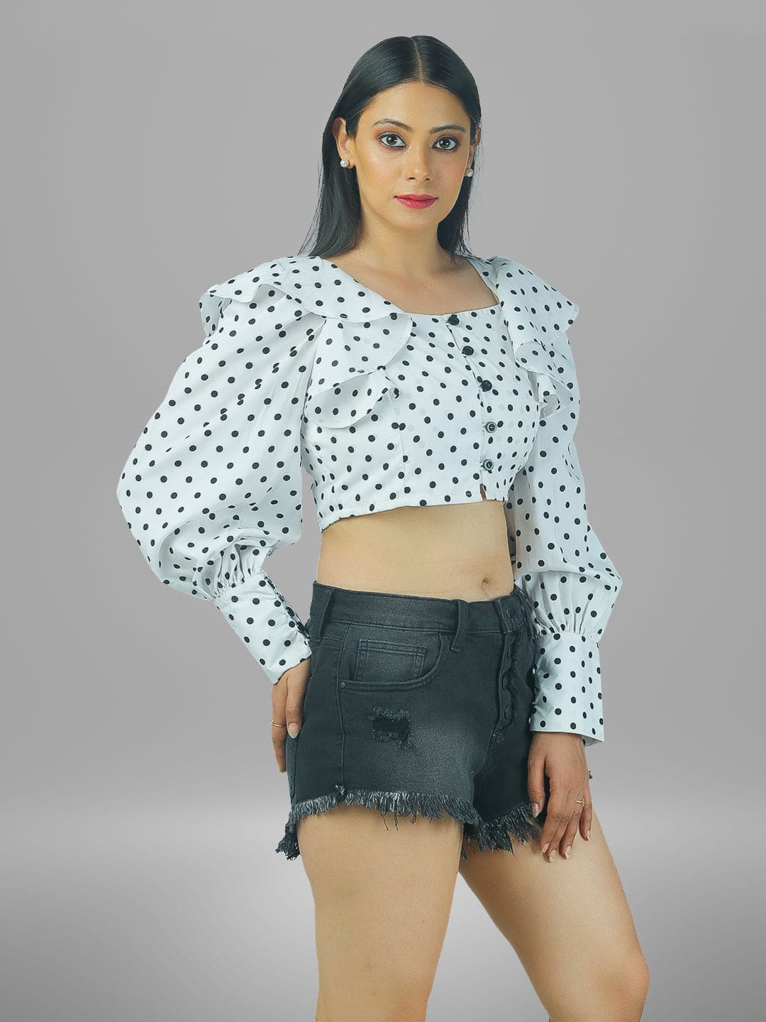 Polka Print top with flounce and bishop sleeve.